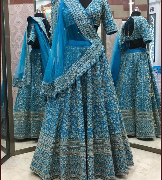 Rich look turquoise malay silk heavy dori embroidered lehenga